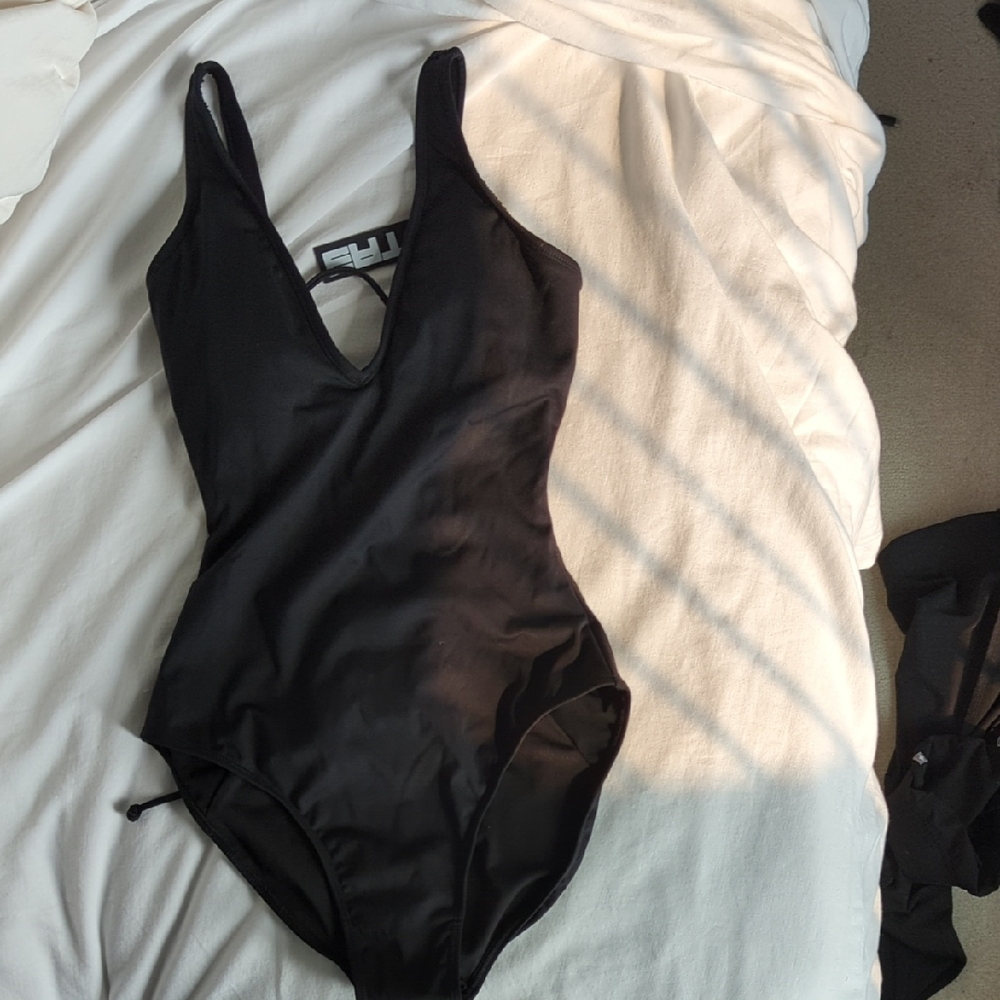 Sleek Black One-Piece Swimsuit with Scoop Neckline